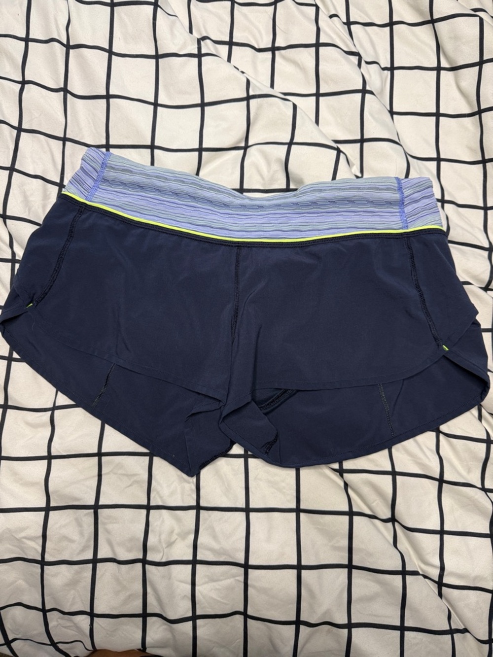 lululemon athletica navy shorts with light blue and neon trim